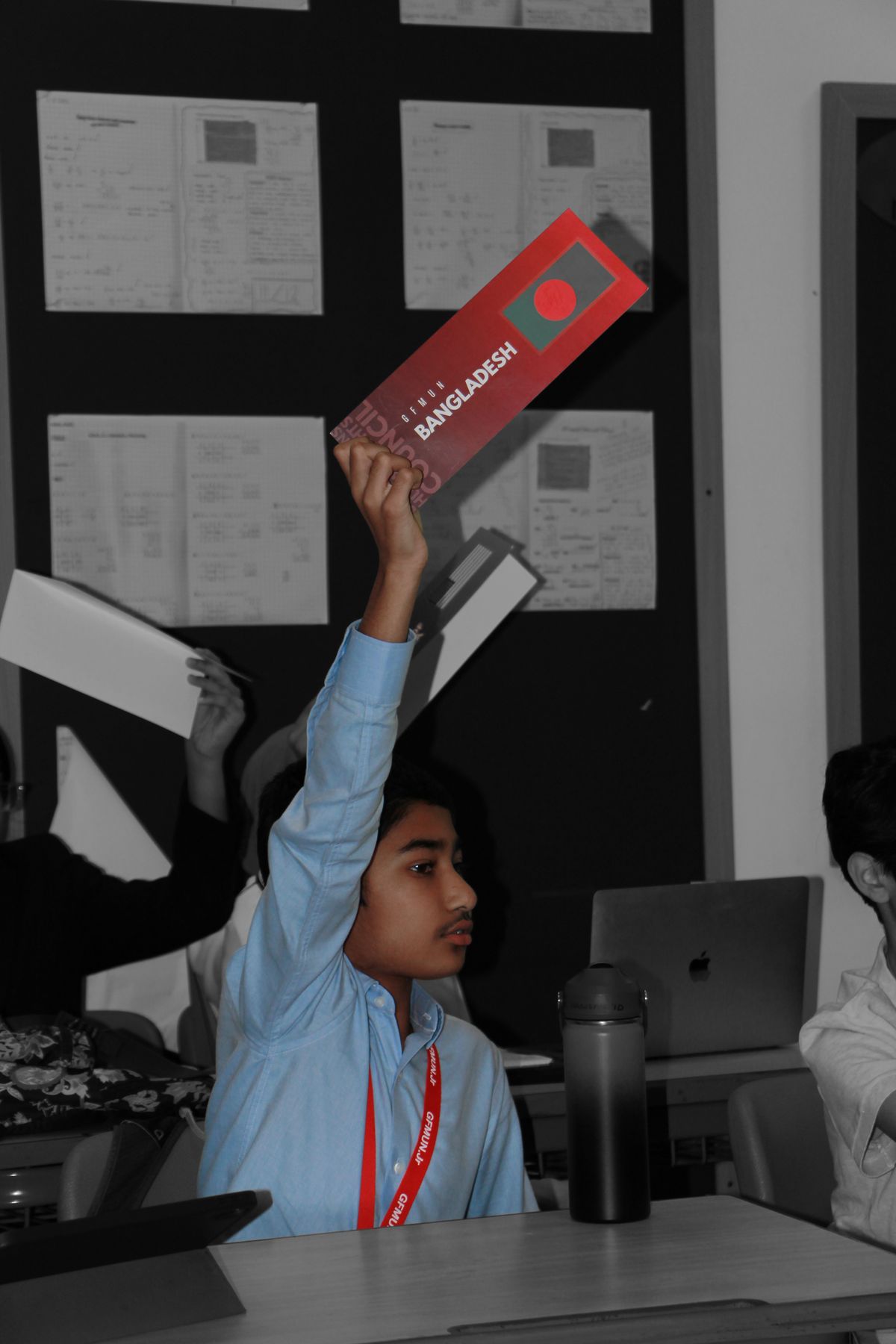 Delegates collaborating during a GFSMUN committee session